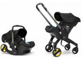 Doona Car Seat & Stroller-Nitro Black Inc FREE Vehicle Seat Protector